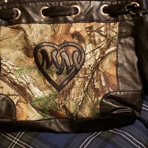 A metal mulisha purse